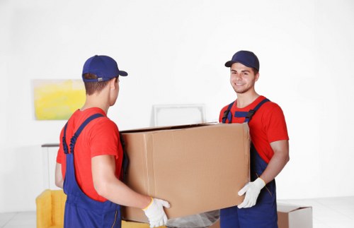 Moving team using safety equipment during a Dulwich removal
