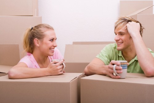 Removal team handling boxes and furniture for a Dulwich move
