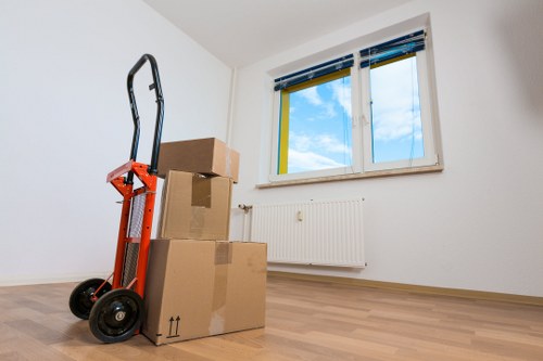 Student furniture and boxes being prepared for a move