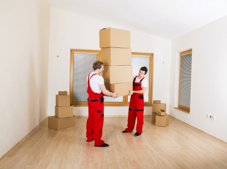 Loading furniture into a local removal truck in Dulwich