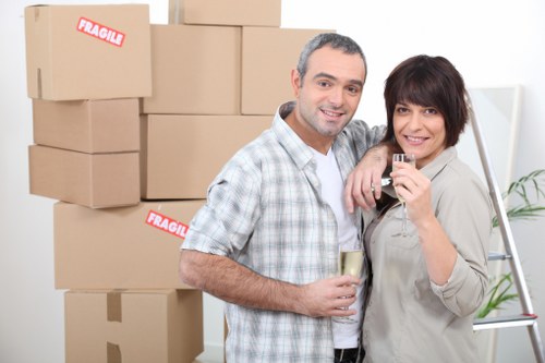 Mover wearing PPE while loading items safely